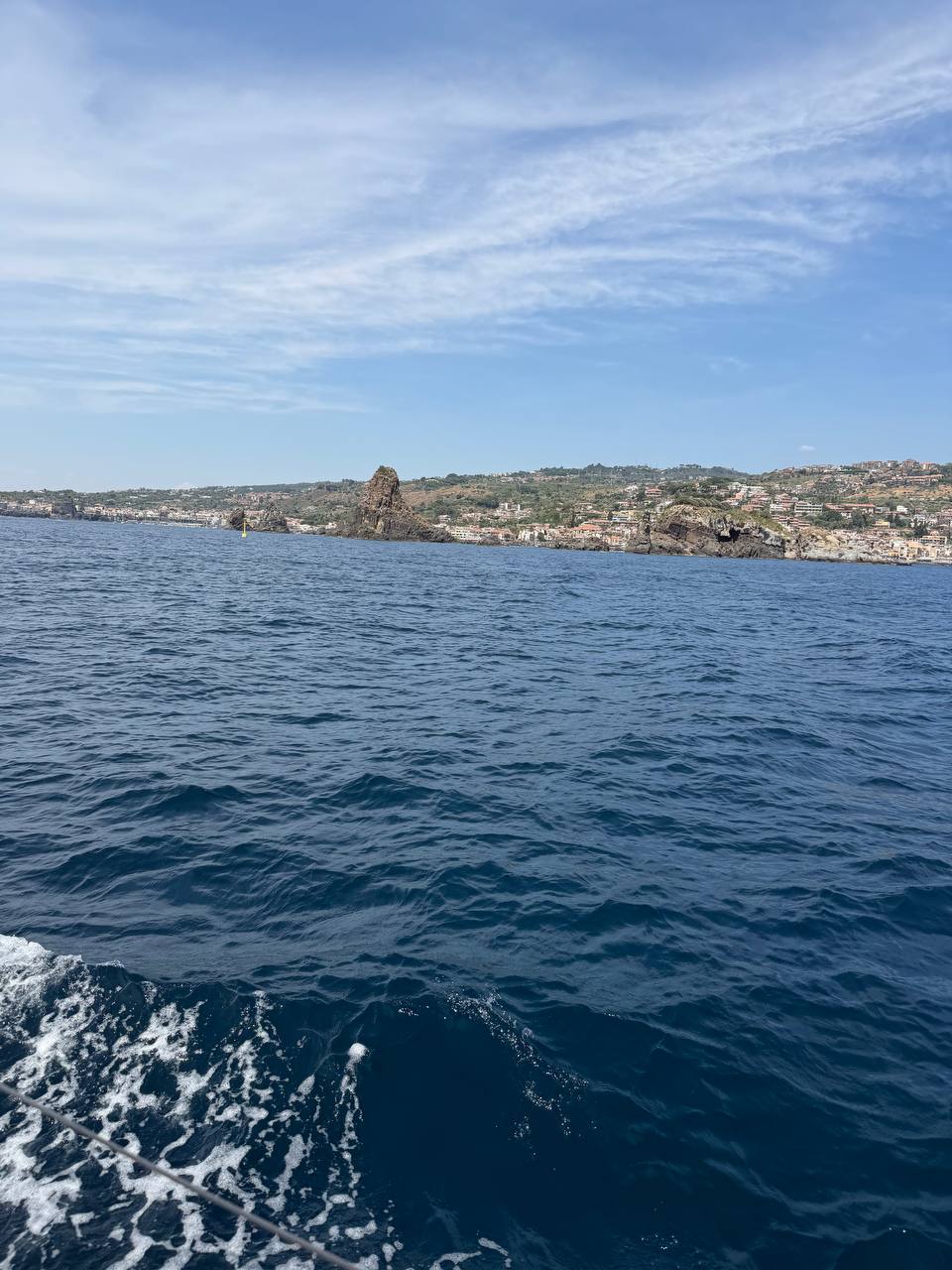 Aci Trezza coastline and sea stacks from Everything Zen on the Catania approach